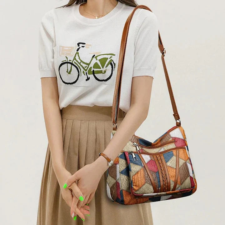 Bolso de mano de piel con mosaico
